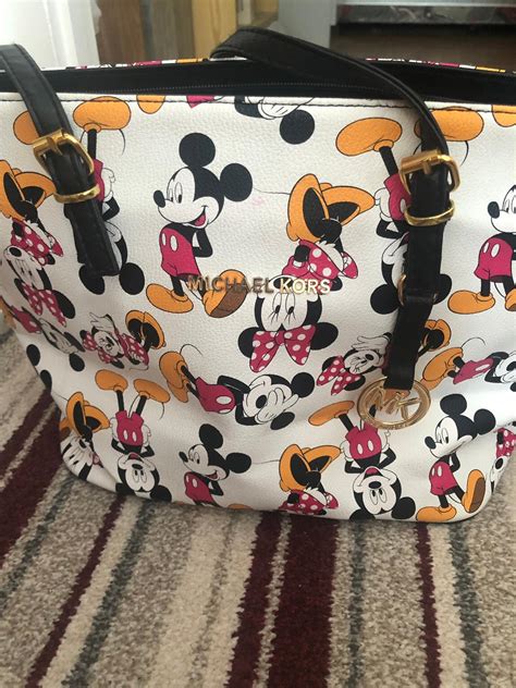 michael kors portemonnaie mickey mouse|Michael Kors honeymoon bag.